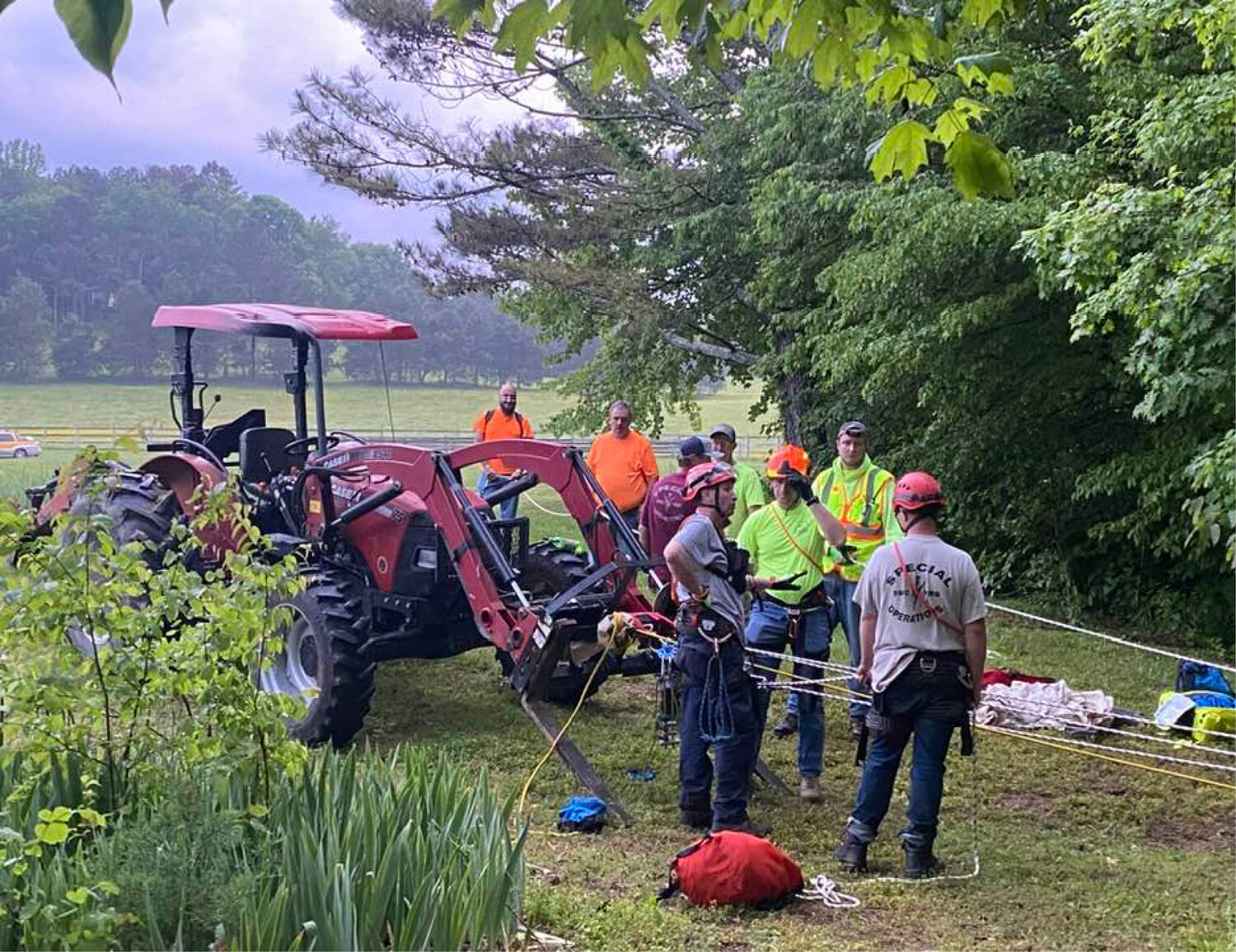 Sparta-White County Rescue Squad arrived on the scene and set up a rope system to lower a member of the team over the bluff, with a small animal harness to assist in retrieval of a dog.